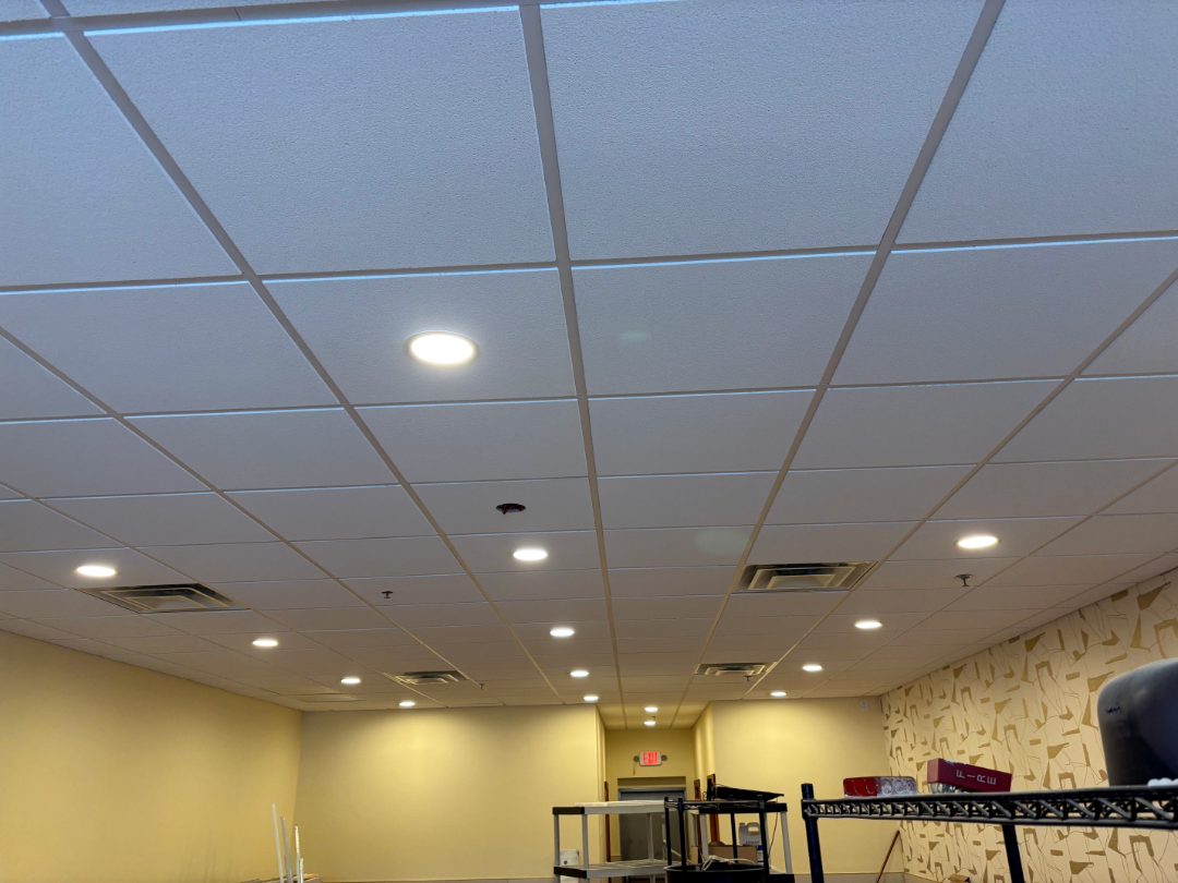 2 by 2 lay-in tile ceiling with recessed can lights